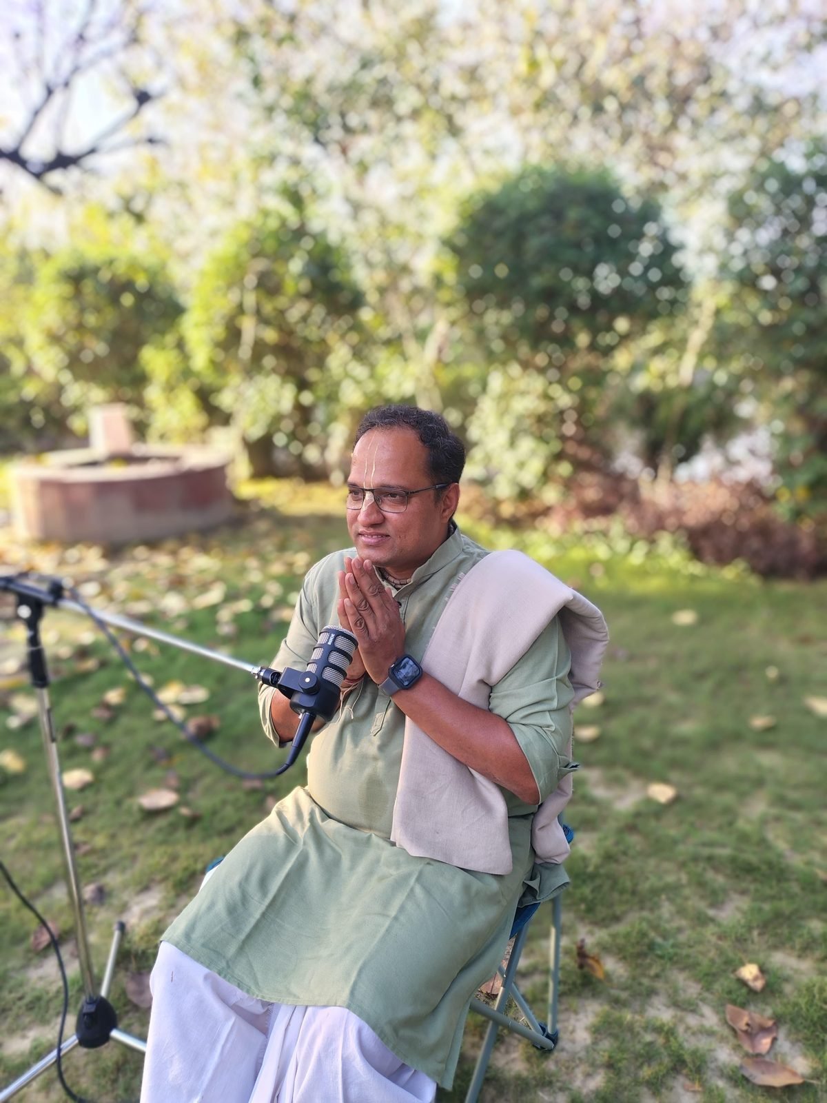 Brajsundar Das speaking at an outdoor program